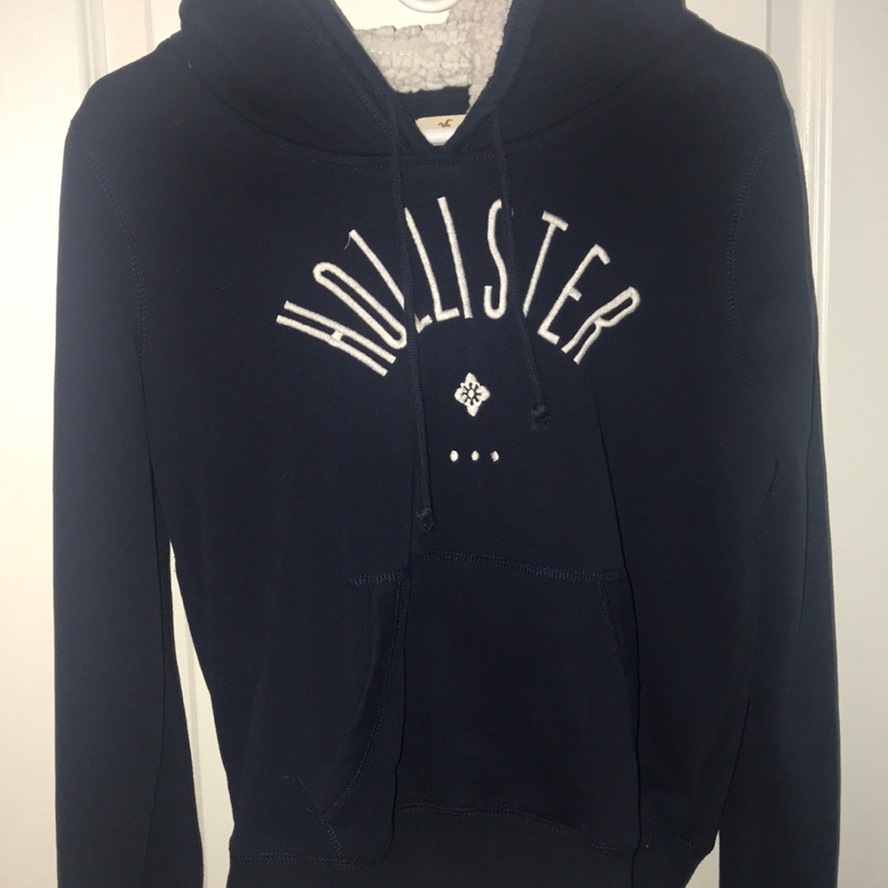 Navy blue and white sweatshirt